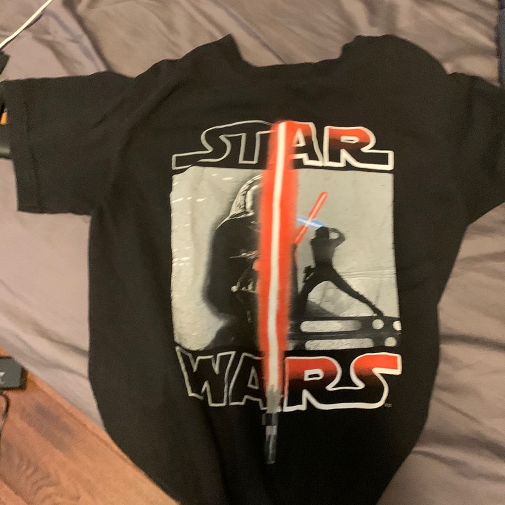 Star wars lightsaber T shirt, selling because it doesnt fit anymore